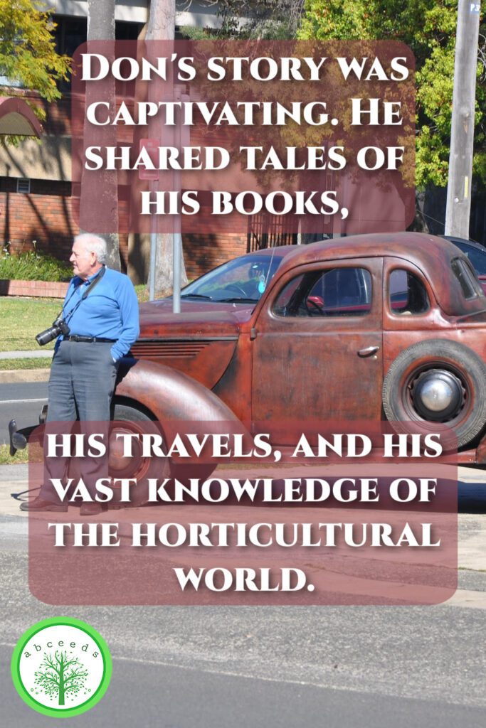 Don Ellison, Nowra, 2018, posing with camera in front of an old T model ford in front of Nowra museaum with quote.