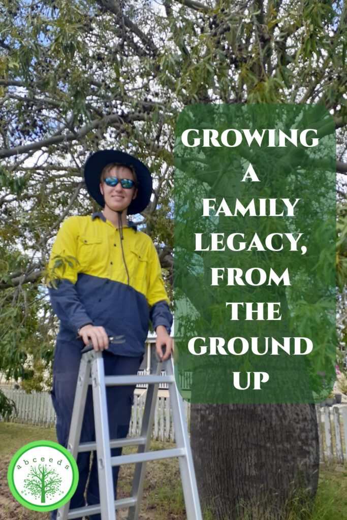 Picture of Toby Woolcott on a ladder next to a Bottle tree, with a quote.