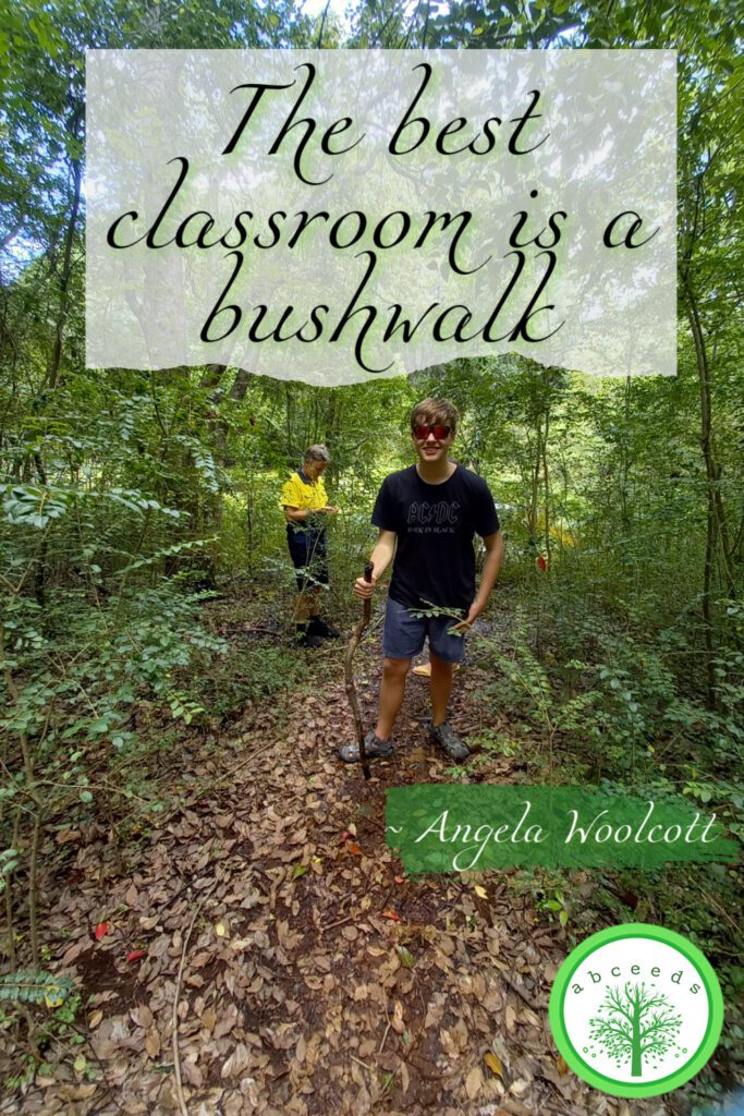 Photo of Toby and Brad Woolcott in the bush, on a walk with the quote 'The best classroom is a bushwalk'.